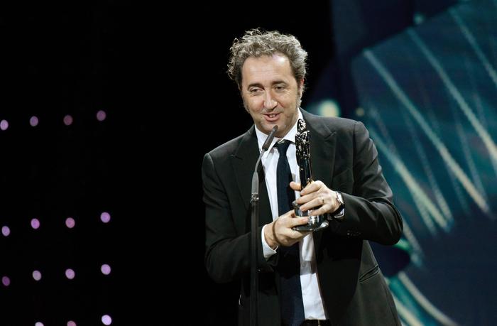epa05066942 Italian director Paolo Sorrentino receives the award for best European Director during the 28th European Film Award ceremony in Berlin, Germany, 12 December 2015. EPA/CLEMENS BILAN
